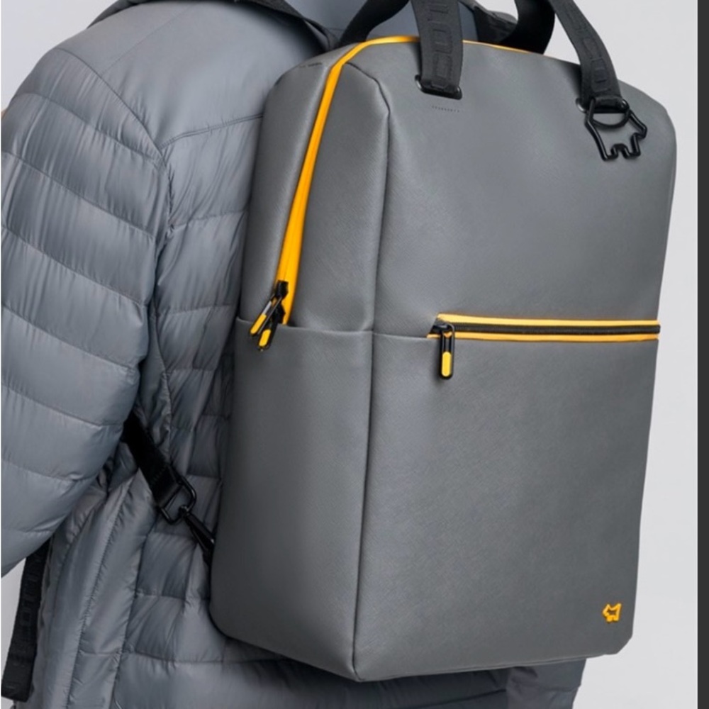 Stylish Gray Backpack with Yellow Accents